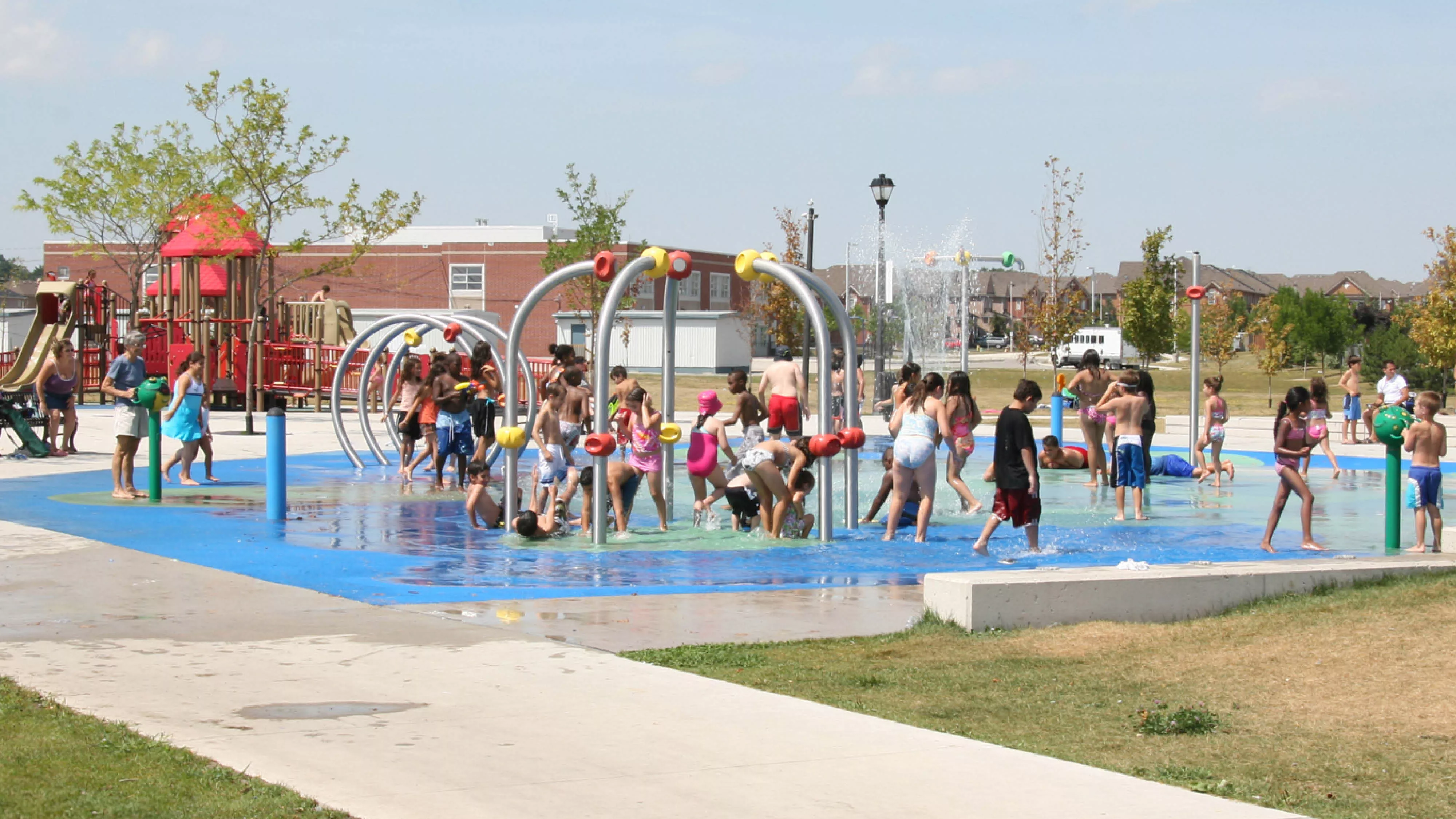 Kids playing in one of the City's splashpads