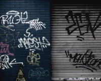 graffiti on a wall and garage door