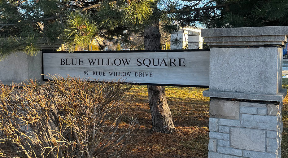 Sign of Blue Willow Square