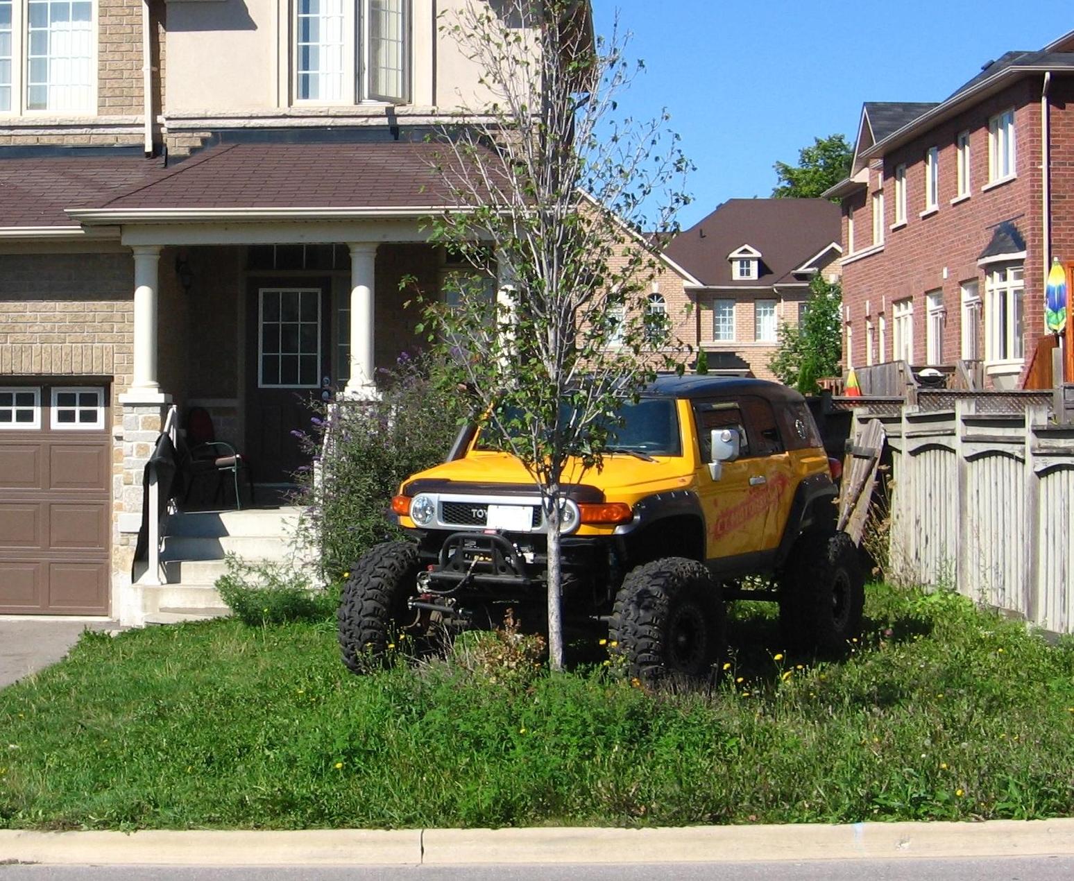 Picture of a recreational vehicle parked incorrectly on a yard