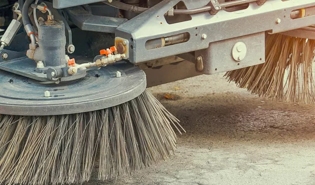 Close-up of street sweeper