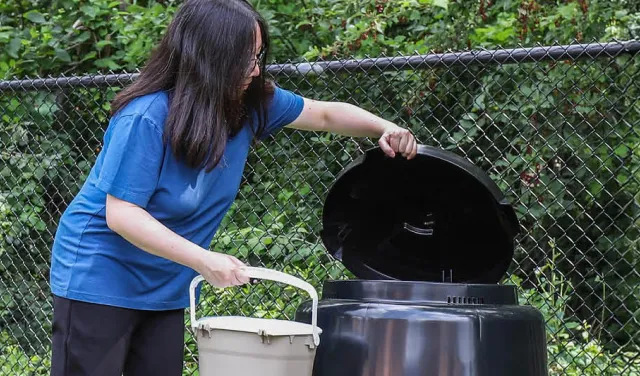 A women putting her compost in a compost bin