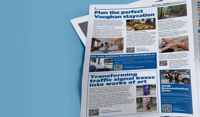 Someone flipping through a newsletter