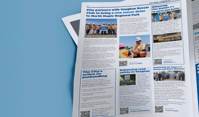 Person flipping through a newsletter