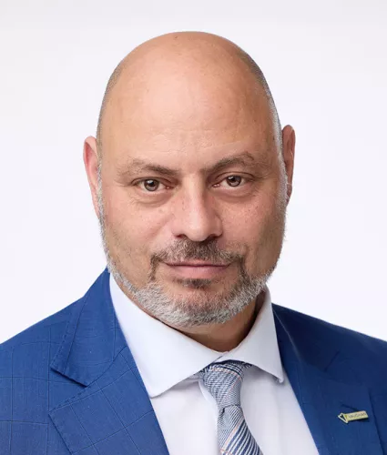 Headshot of Gus Michaels