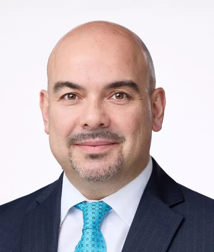 Headshot of Michael Coroneos
