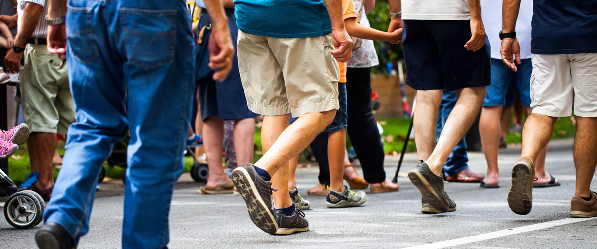 Several people walking.