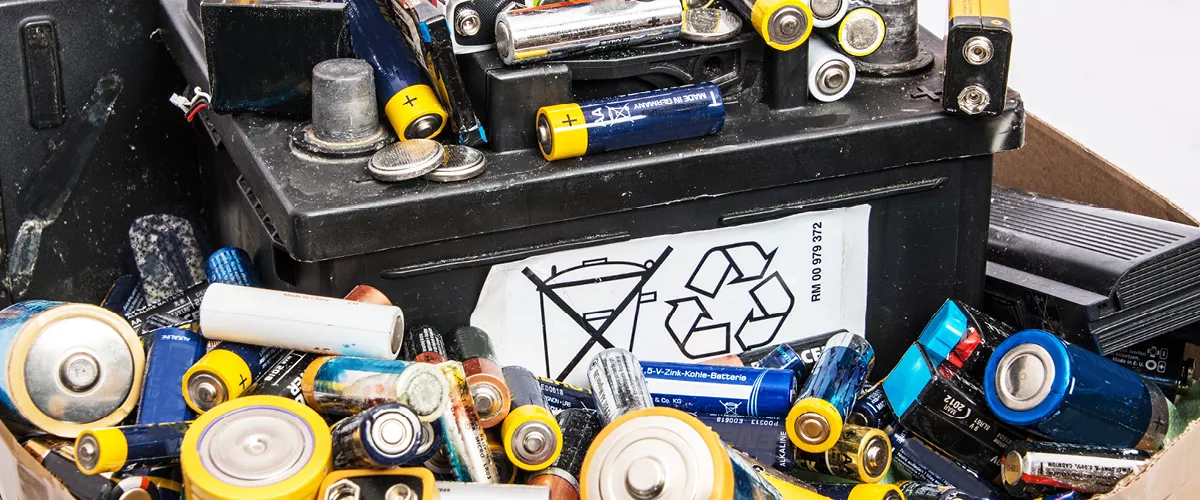 A pile of household hazardous, electronic and battery waste.