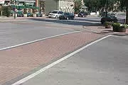 A picture of a textured walk spanning across a street.