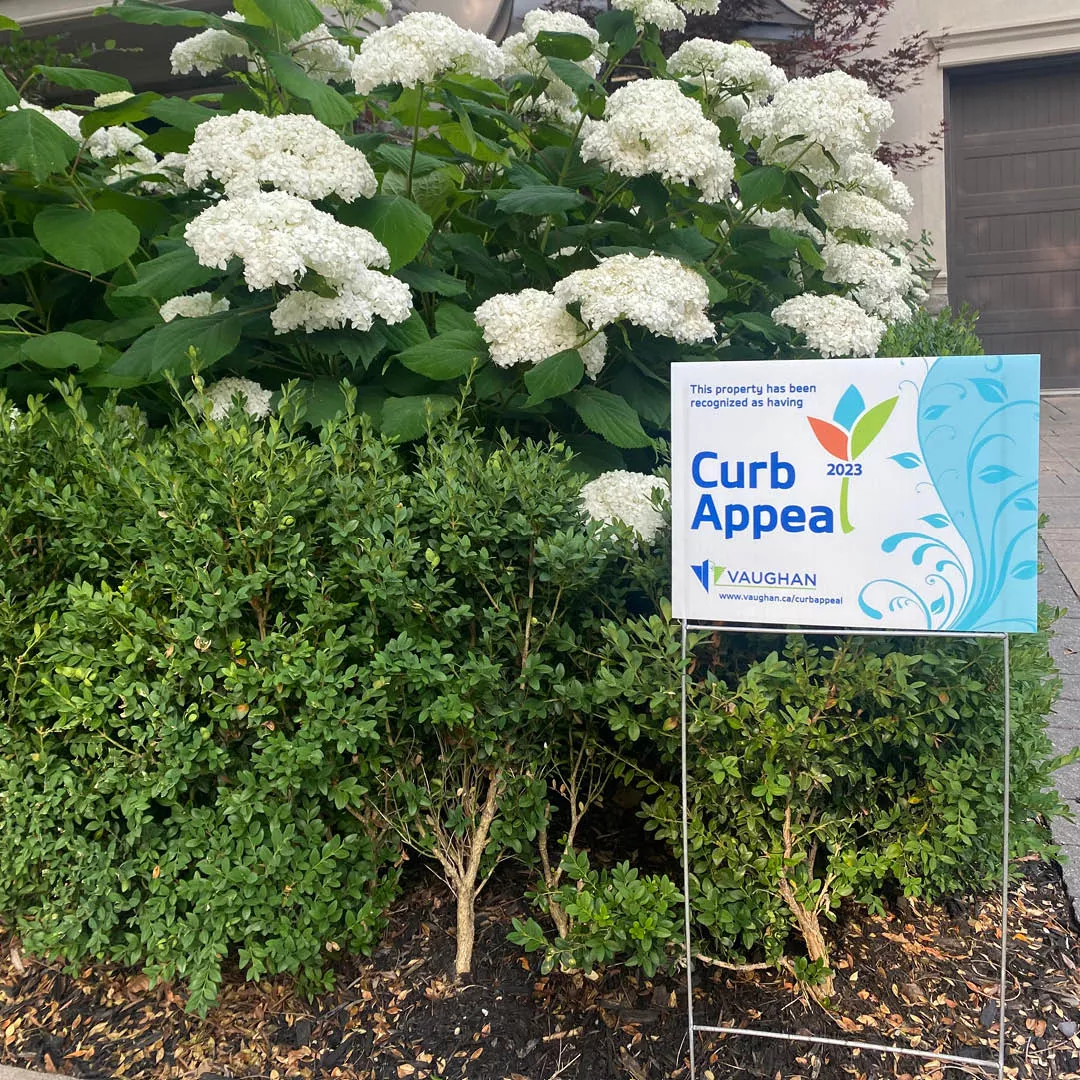 Resident lawn with Curb Appeal sign