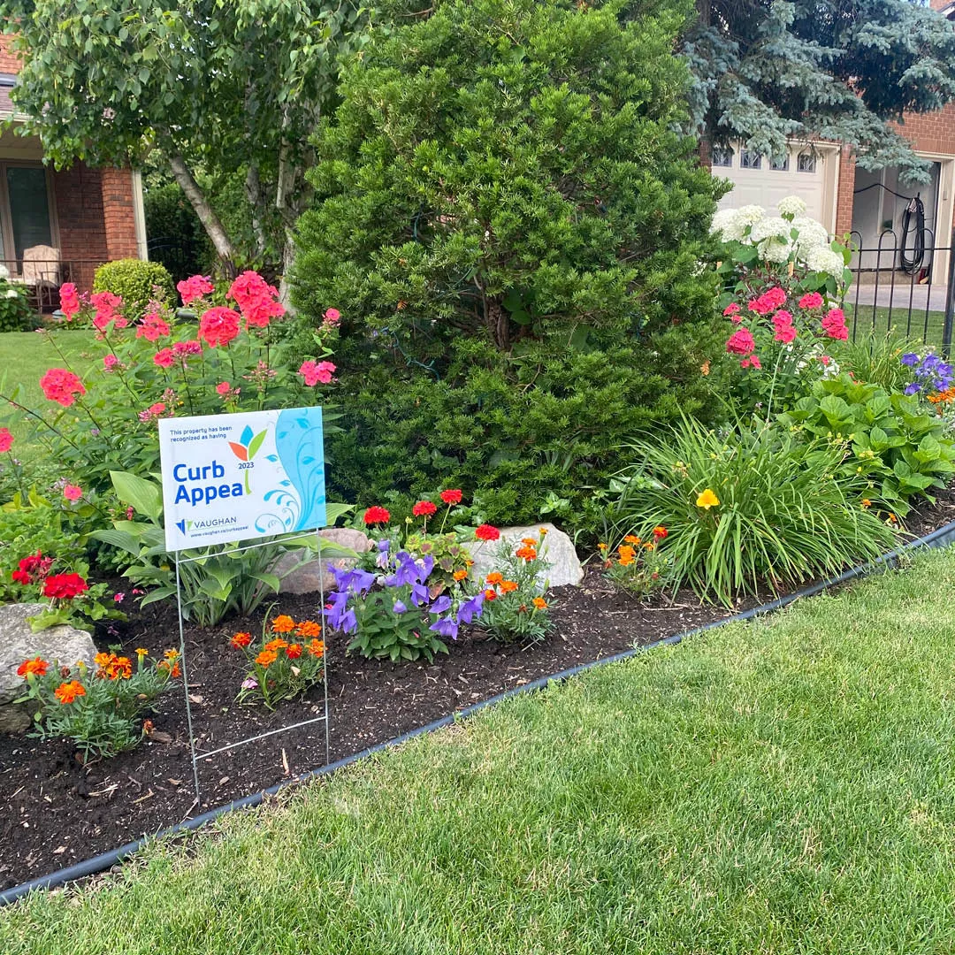 Resident lawn with Curb Appeal sign