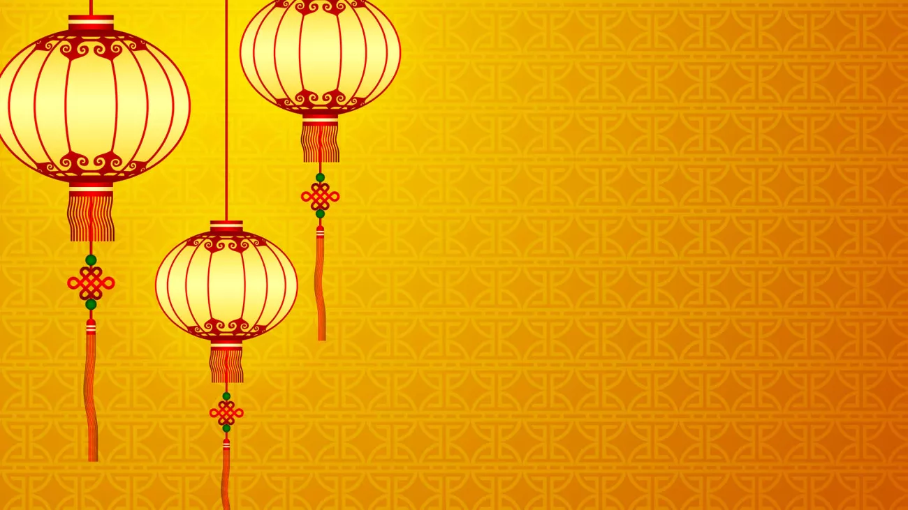 Three paper lanterns on a yellow background