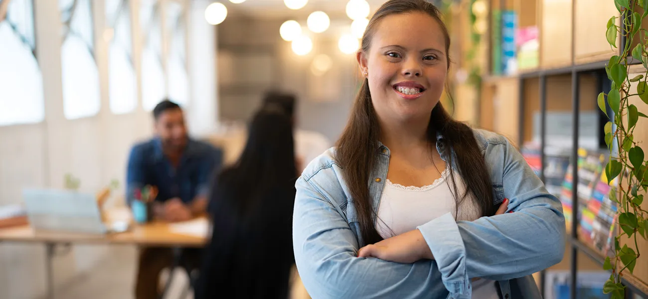 Girl smiling with crossed arms