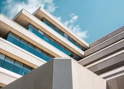 building with many windows under a blue sky