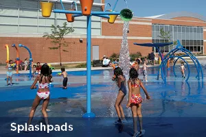 kids playing on a splashpad