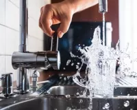 tap water filling a glass