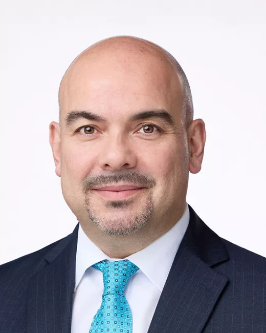 Headshot of Michael Coroneos