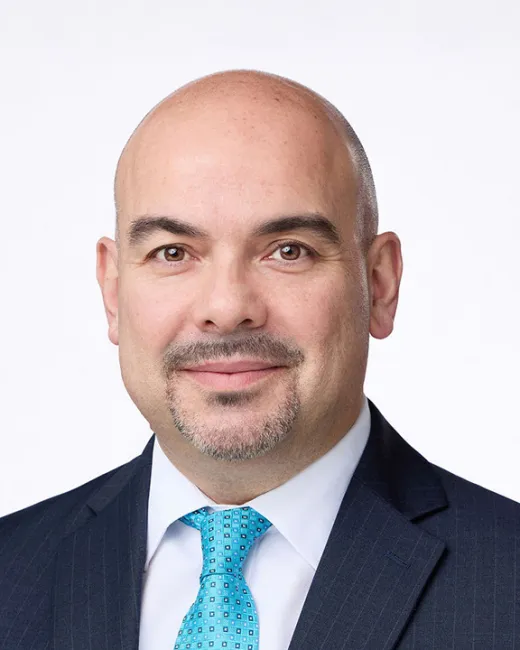 Headshot of Michael Coroneos