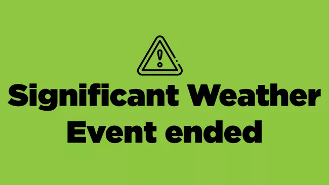 green background and black text saying significant weather event has ended