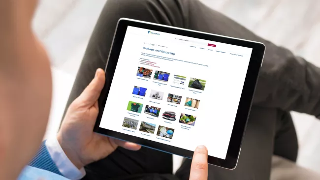 someone visiting vaughan.ca/waste on a tablet