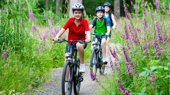 children riding a bike