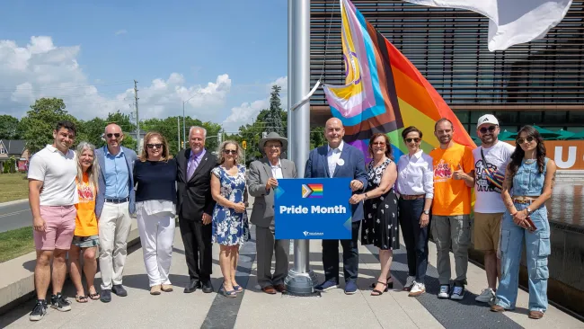 Mayor Steven Del Duca, Members of Council, Member of Parliament for Thornhill Melissa Lantsman, representatives from York Pride, Pflag York Region and spoken-word artist Madeline Rose Fiore in front of Vaughan City Hall at Pride flag raising on June 24, 2025