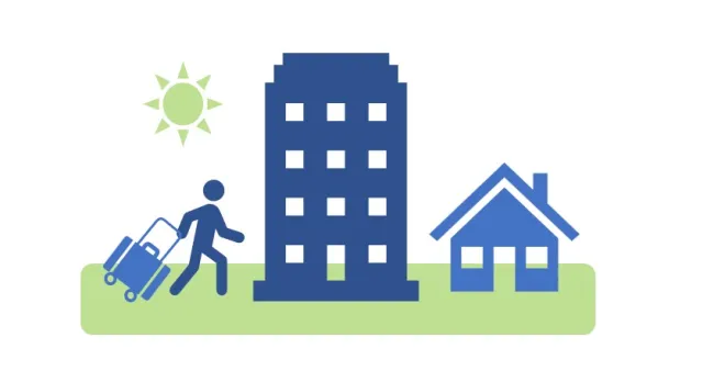 Person walking towards short-term rental housing