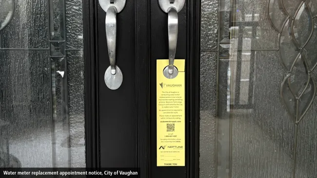 water meter replacement notice doorhanger on a door