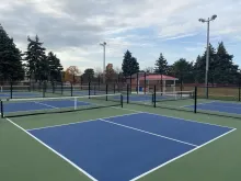 Dedicated outdoor pickleball courts at Le Parc Park