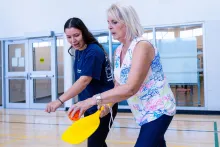 A City instructor teaching Vaughan residents how to play pickleball (Garnet A. Williams Community Centre)