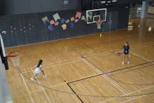 A girl and a Vaughan pickleball instructor rallying 