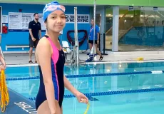Child next to pool