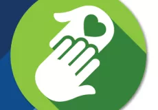 An icon of two hands touching, one with a heart in the palm
