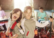 A group of kids playing in a band