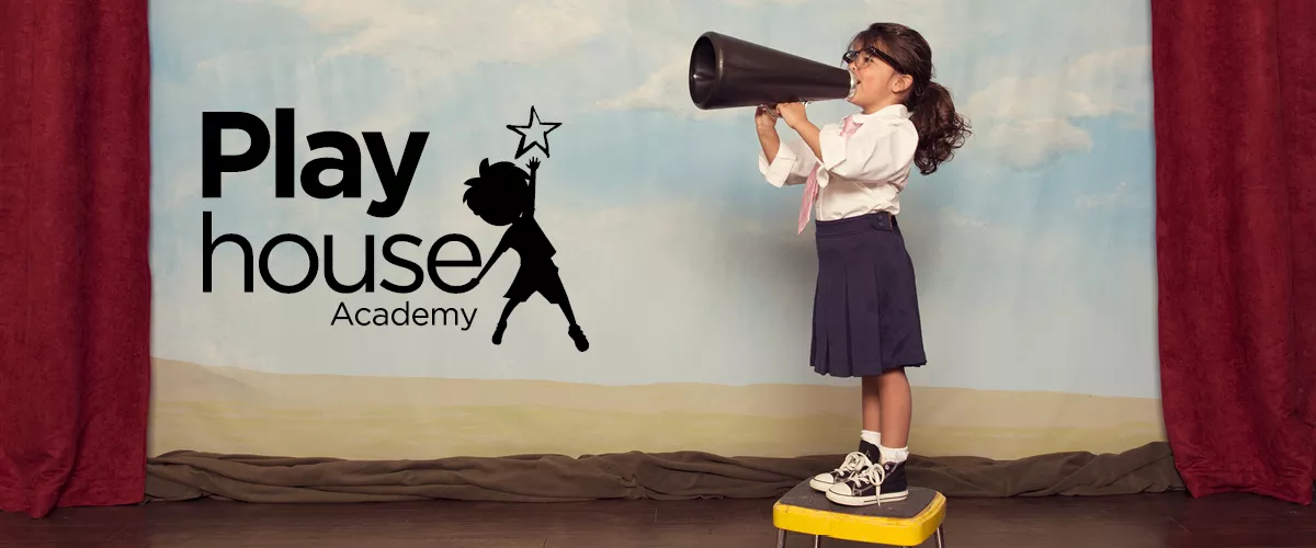 A child with a megaphone beside the "Play house Academy" logo.