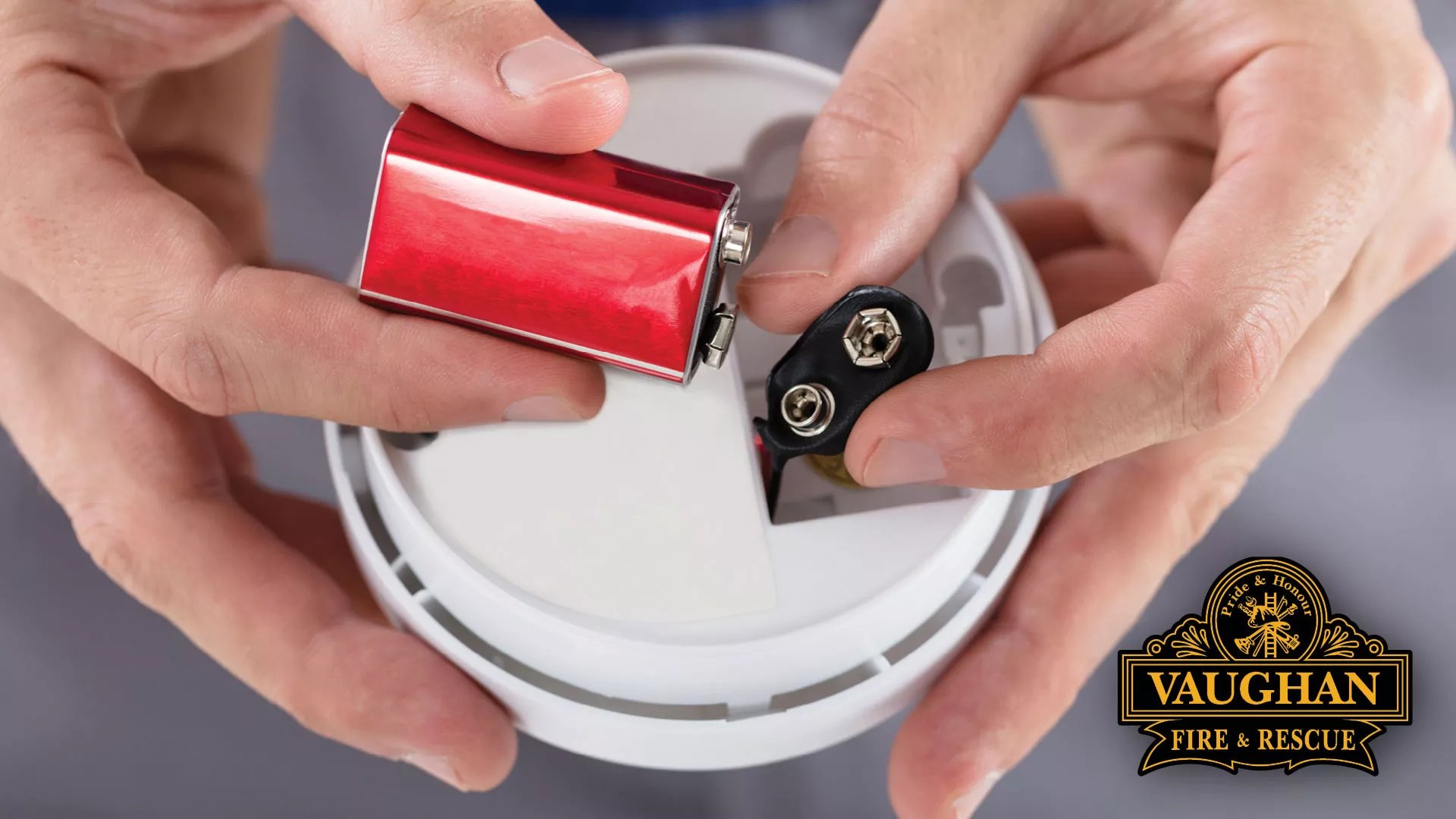 Battery being changed in a smoke alarm