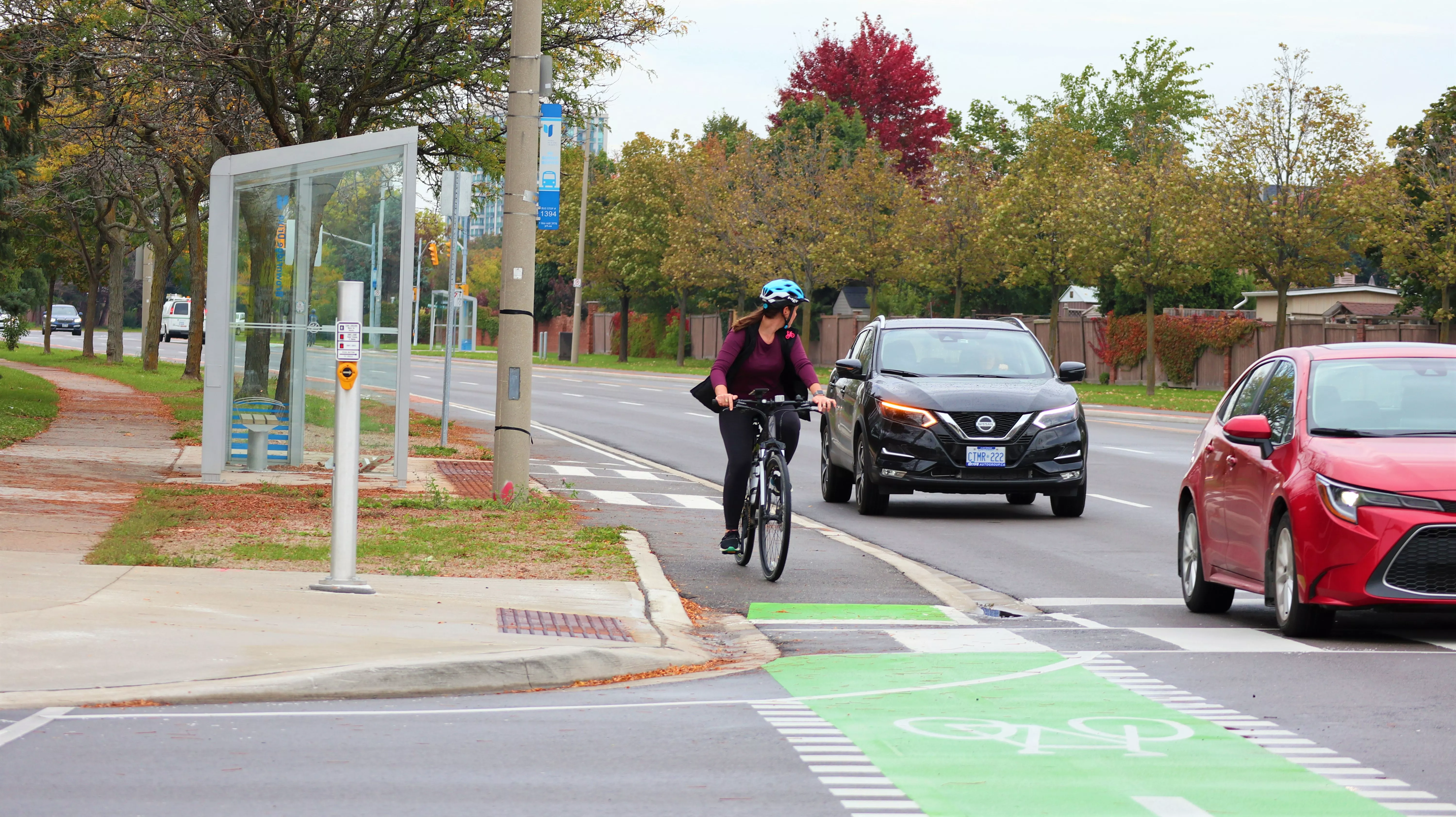 Intersection with separate crossings for cyclists and pedestrians. The cycle track continues through the intersection and runs parallel to where pedestrians would cross. 
