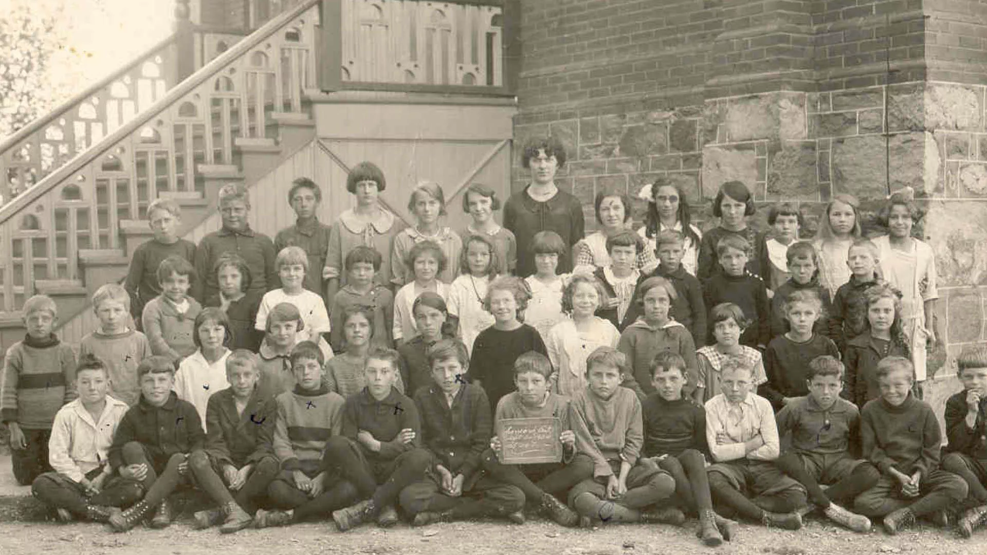 Children in front of a school