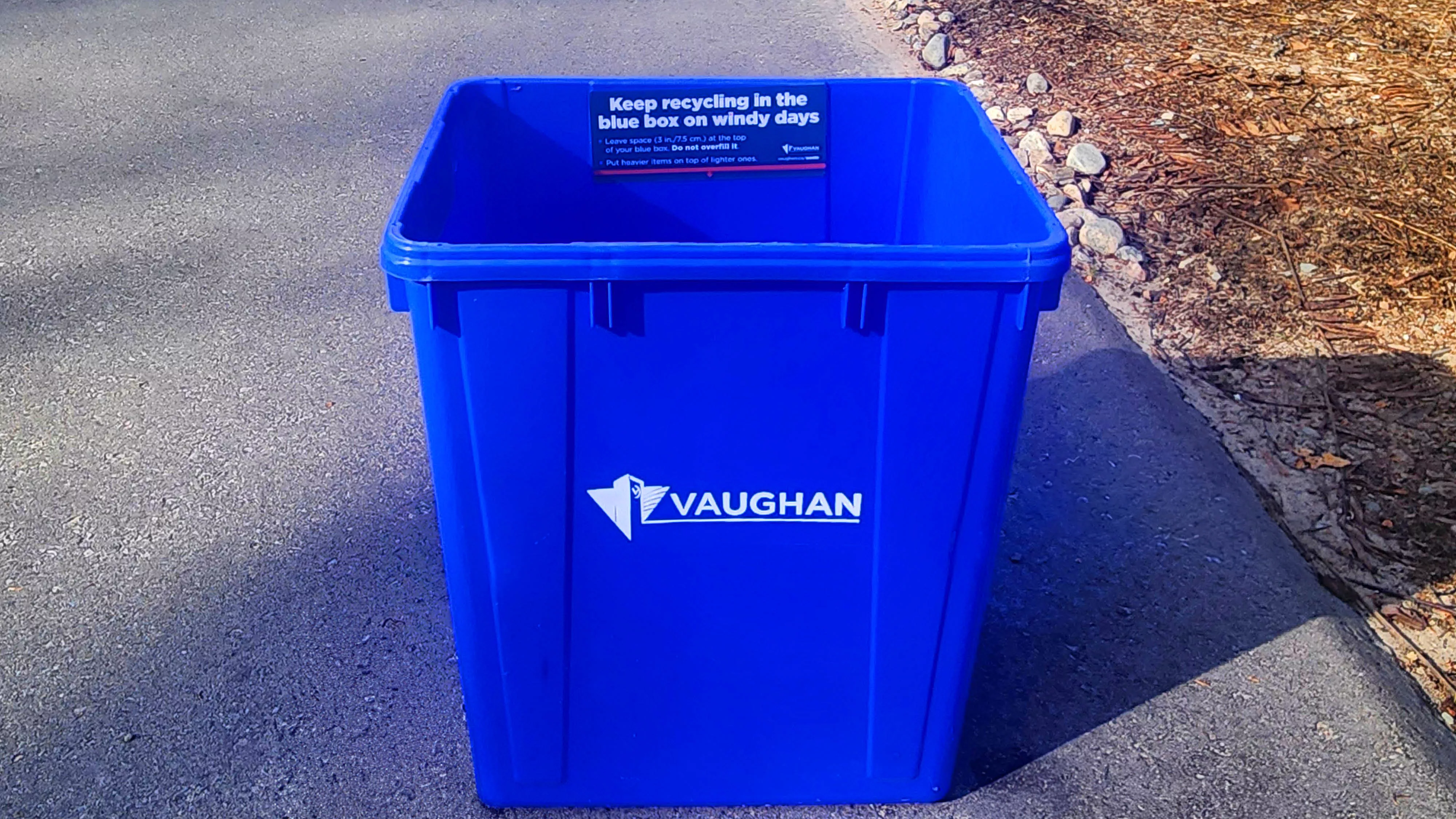 recycling bin on a driveway