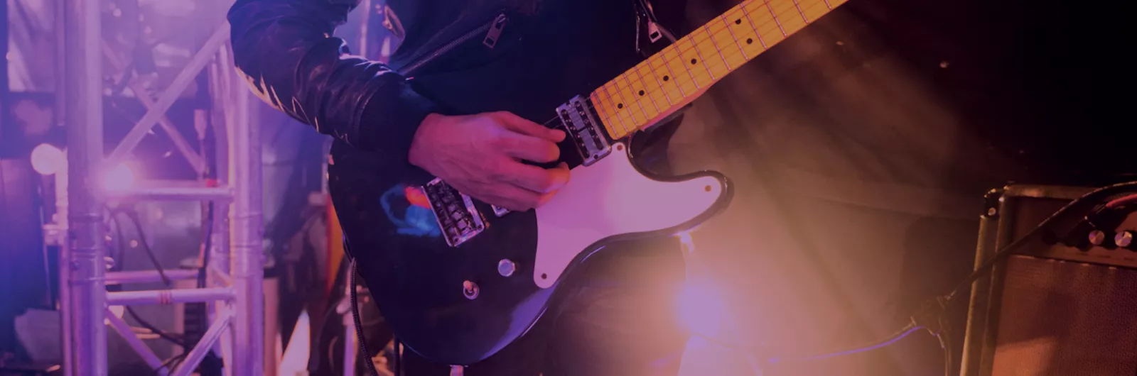 hand playing guitar