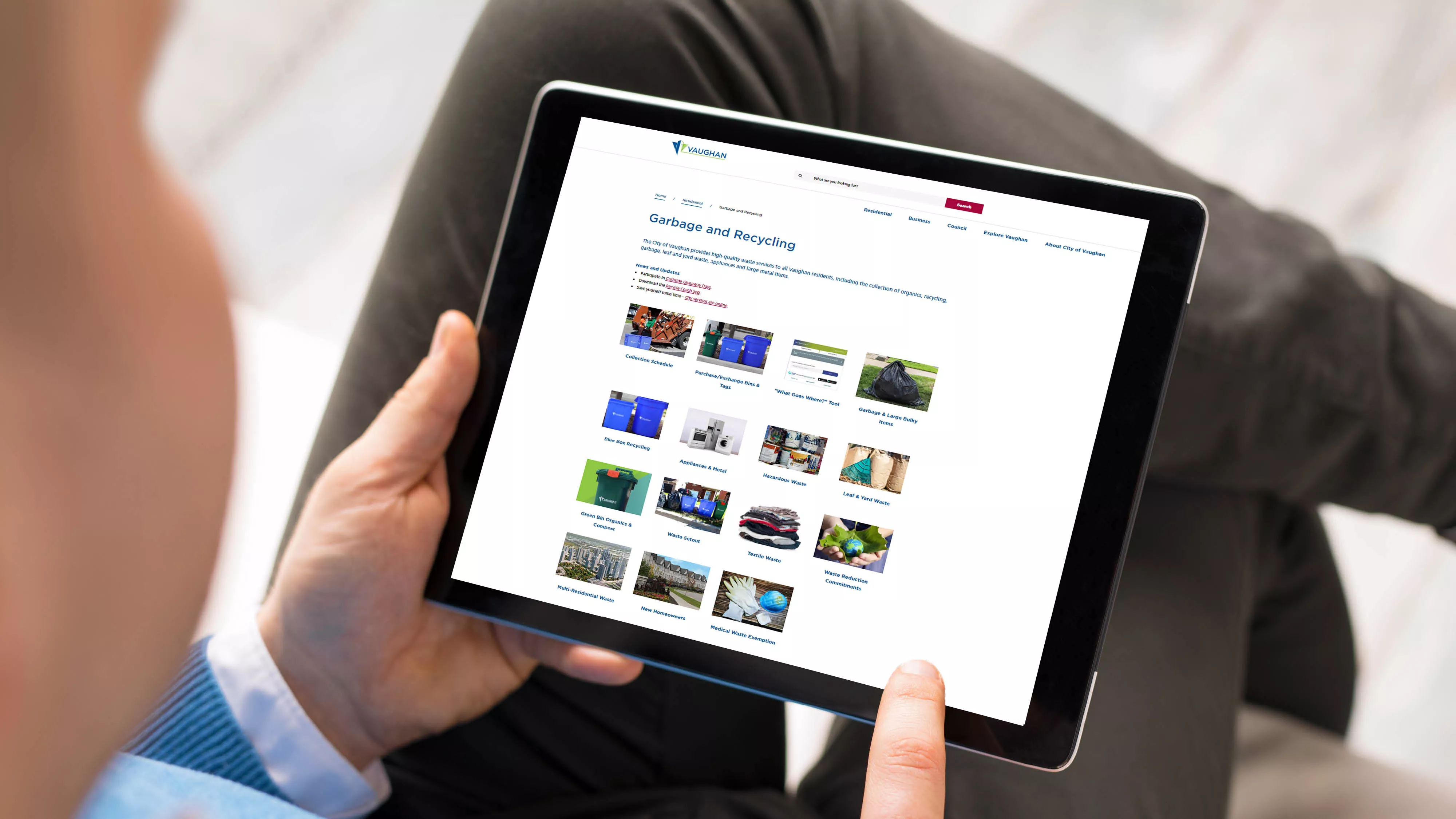 someone visiting vaughan.ca/waste on a tablet