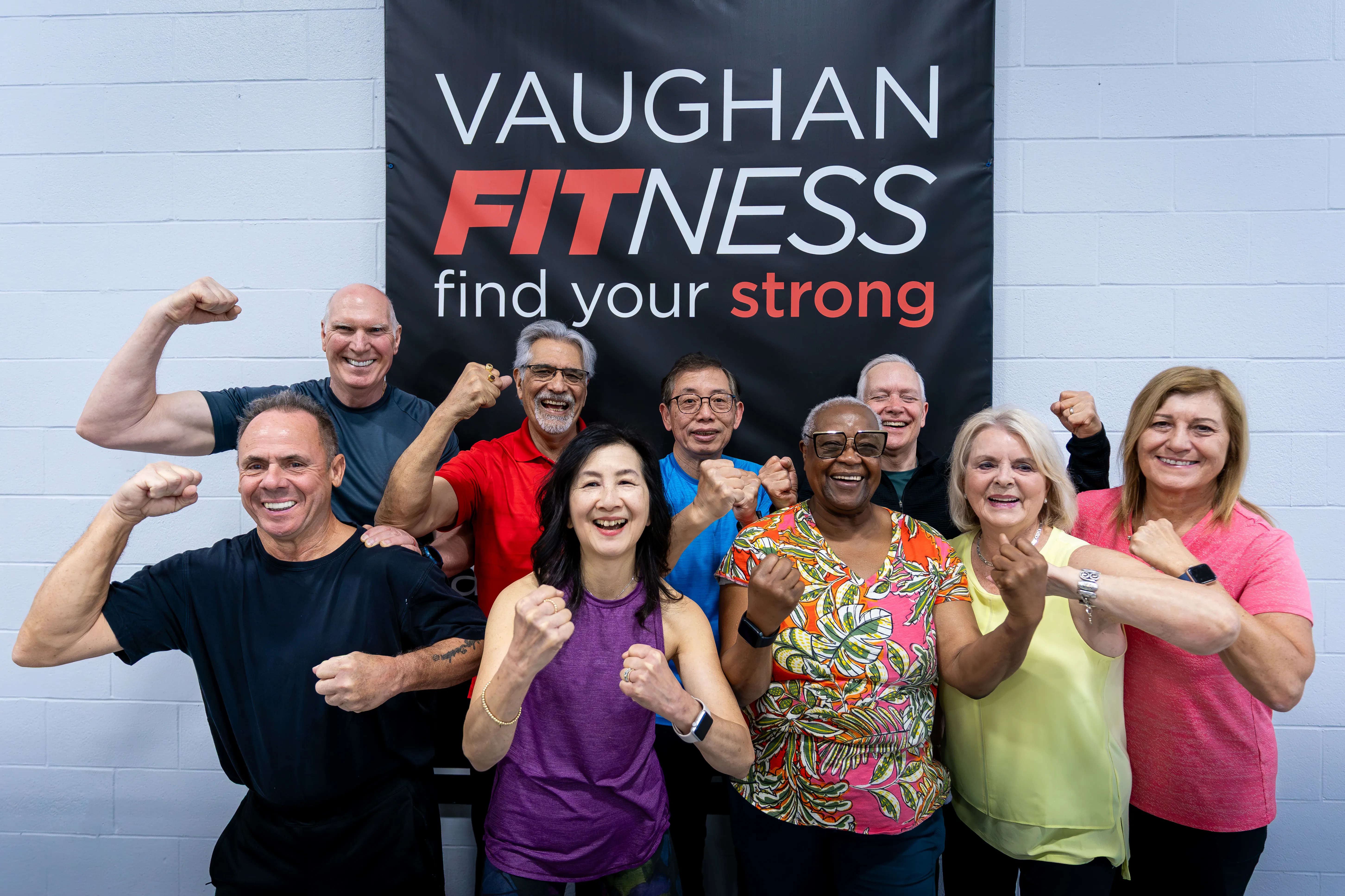 Group of Older Adults in front of Vaughan Fitness sign