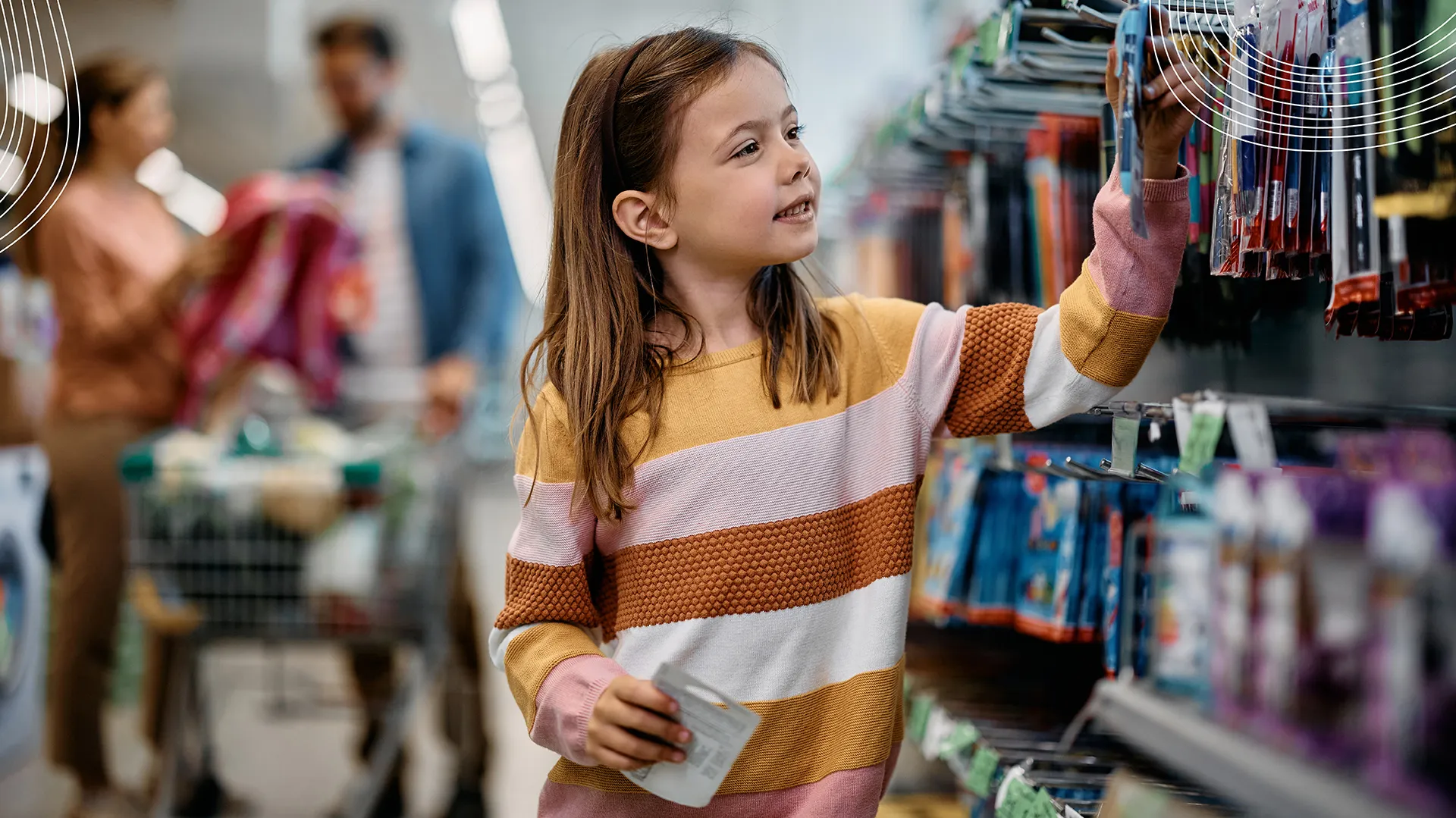 girl looking at pencils in store
