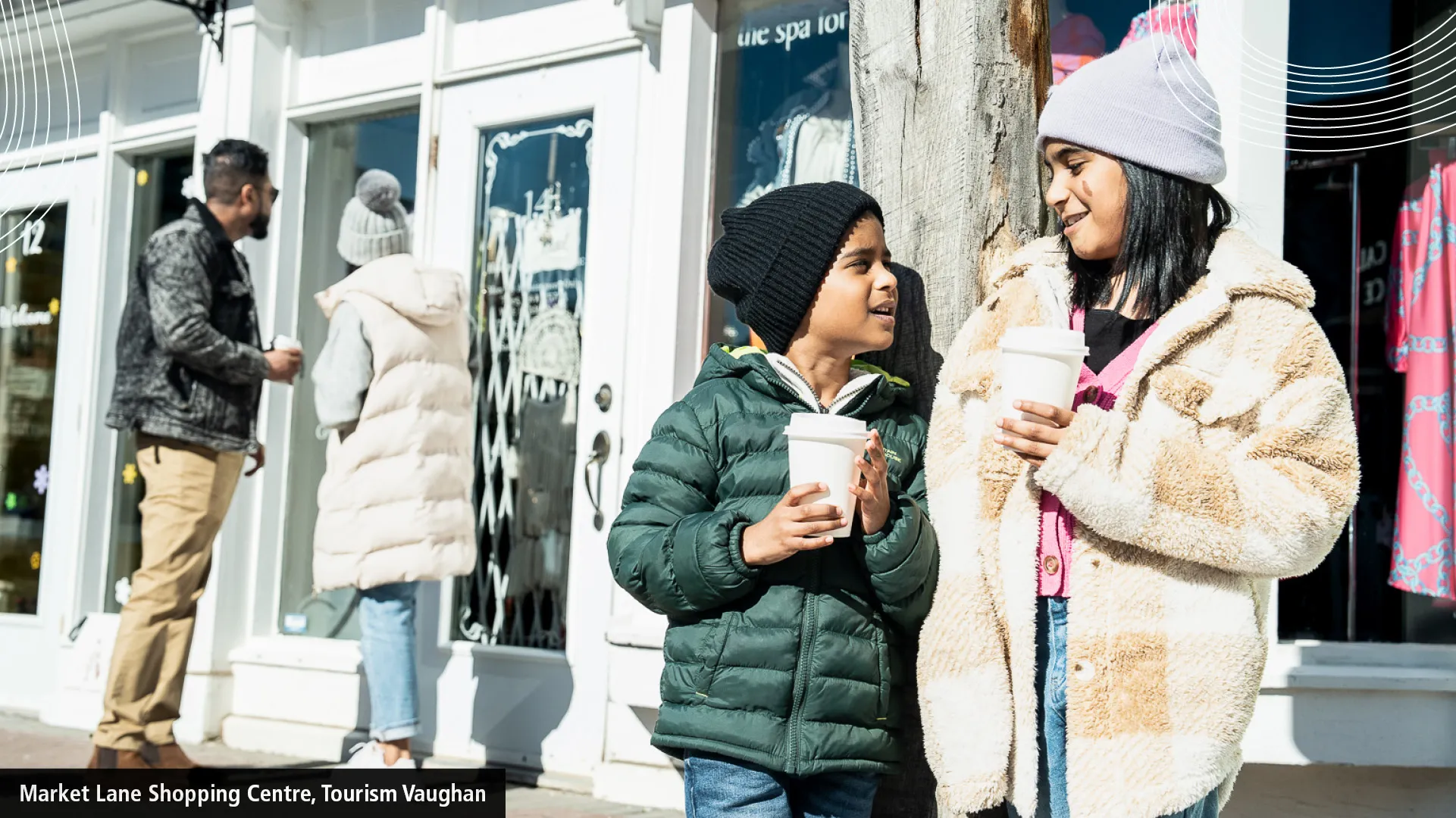 family in front of a shop on Woodbridge Ave.